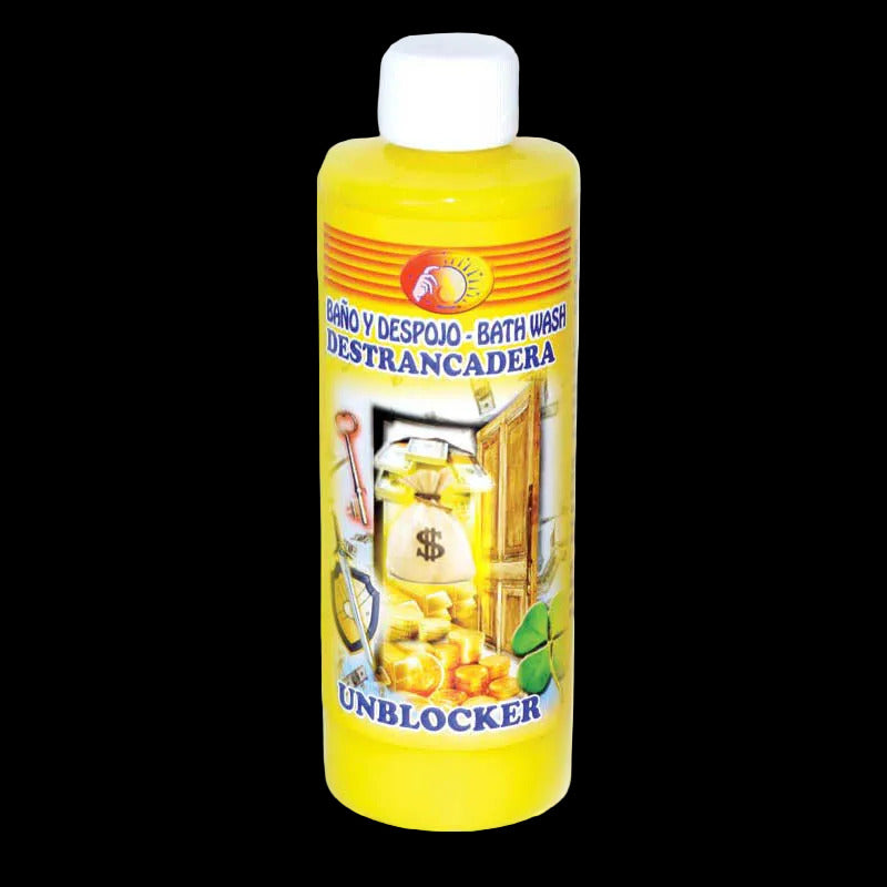 A plastic bottle of Unblocker ritual wash with a yellow label featuring illustrations such as a key, money, and a door, indicating the product's use in removing obstacles and barriers.